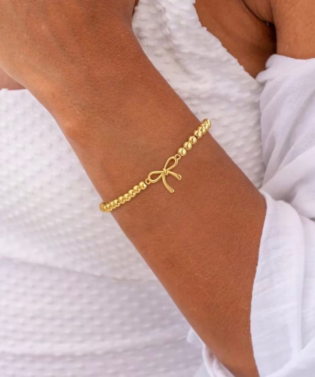 Golden Bow Charm Bracelet